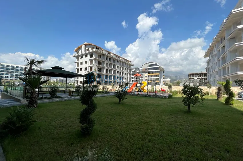 Квартира под ключ в 200 метрах от моря в комплексе комфорт-класс  – Алания, район Каргыджак  11 