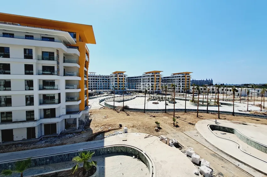 Фото -  Двухкомнатная квартира 85 м2 в строящемся комплекс-отеле в Алании, район Тюрклер 12 