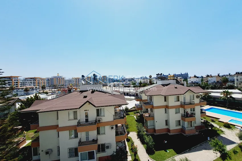 Приобрести Двухкомнатная квартира 85 м2 в строящемся комплекс-отеле в Алании, район Тюрклер 12 