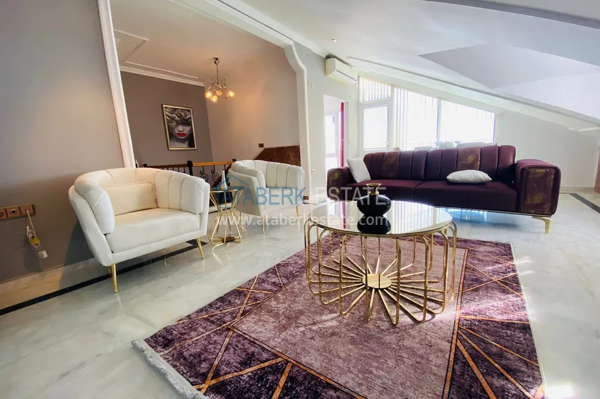 Приобрести Роскошный видовой дуплекс с дизайнерским ремонтом и новой мебелью на первой береговой в Махмутларе, Алания 17 