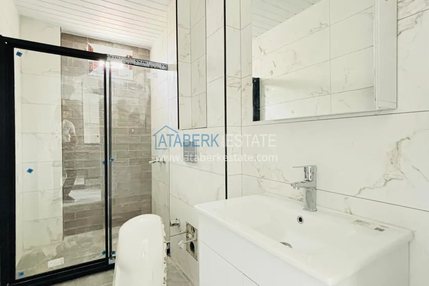 Приобрести Двухкомнатная квартира с застекленным балконом! Новостройки в Мерсине, район Мезитли 12 