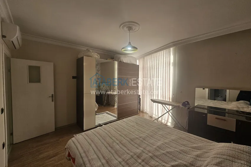 Приобрести Линейная четырехкомнатная квартира с отдельной кухней в районе Джикджилли, Алания 12 