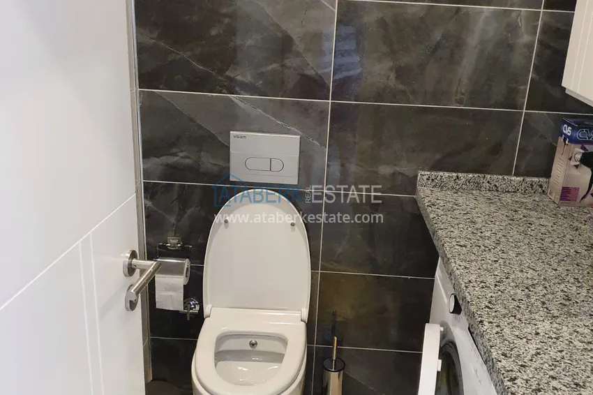 Приобрести Квартира под ключ в 200 метрах от моря в комплексе комфорт-класс  – Алания, район Каргыджак  12 