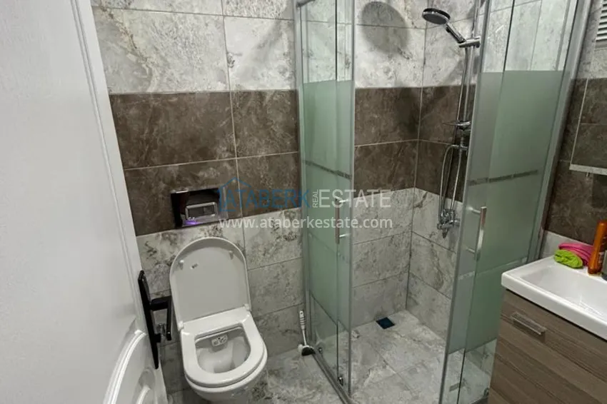 Приобрести Великолепные террасные апартаменты с мебелью и видом на море в Алании, район Махмутлар 13 