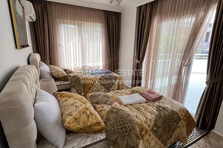 Приобрести Трехкомнатная квартира с мебелью в Алании, район Махмутлар 13 