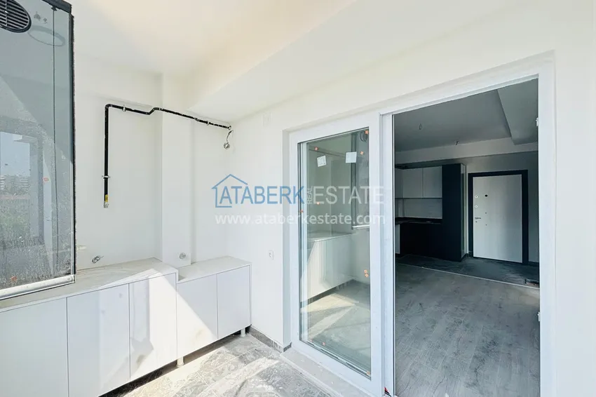 Приобрести Двухкомнатная квартира с застекленным балконом! Новостройки в Мерсине, район Мезитли 13 