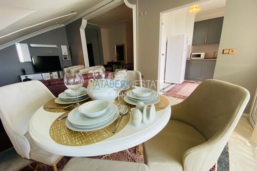 Приобрести Роскошный видовой дуплекс с дизайнерским ремонтом и новой мебелью на первой береговой в Махмутларе, Алания 19 