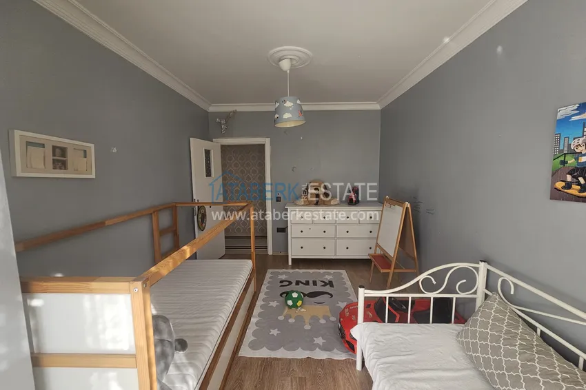 Приобрести Линейная четырехкомнатная квартира с отдельной кухней в районе Джикджилли, Алания 14 