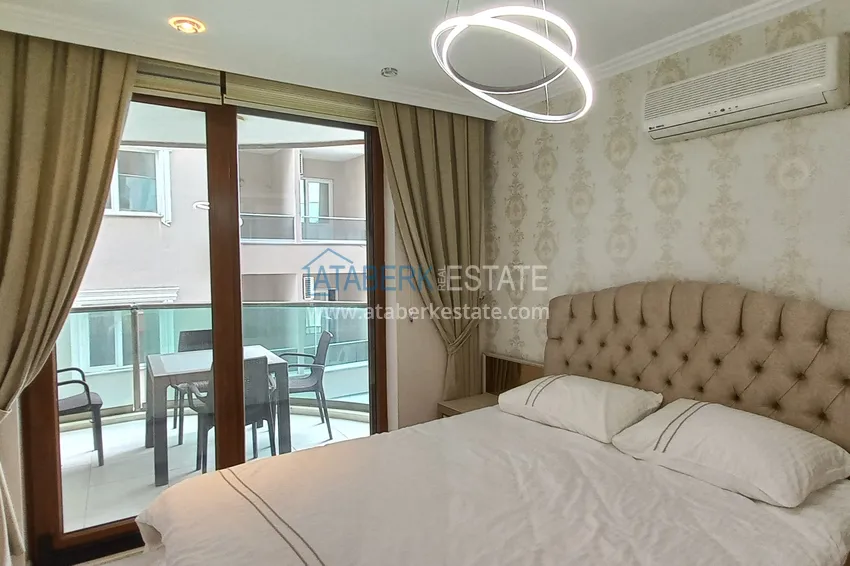 Приобрести Стильная квартира с видом на море в комплексе на первой береговой – район Оба, Алания 15 