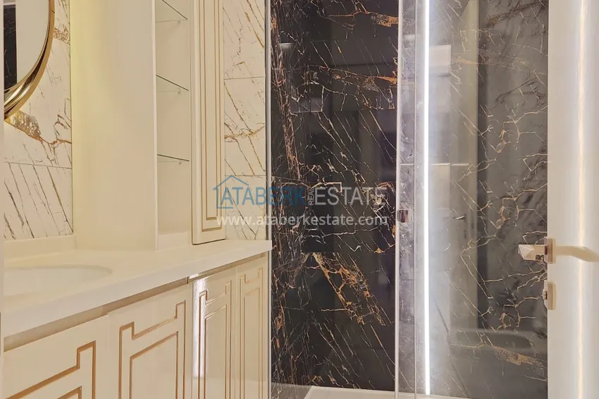 Приобрести Квартира с чистовой отделкой на первой береговой линии - Алания, район Махмутлар 15 