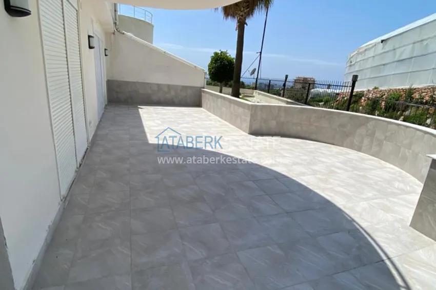 Приобрести Великолепные террасные апартаменты с мебелью и видом на море в Алании, район Махмутлар 15 