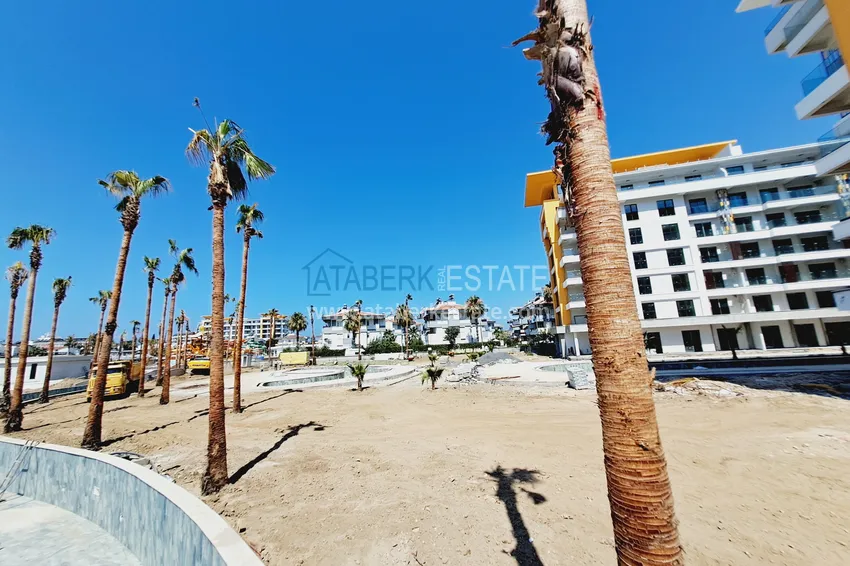 Фото -  Двухкомнатная квартира 85 м2 в строящемся комплекс-отеле в Алании, район Тюрклер 14 