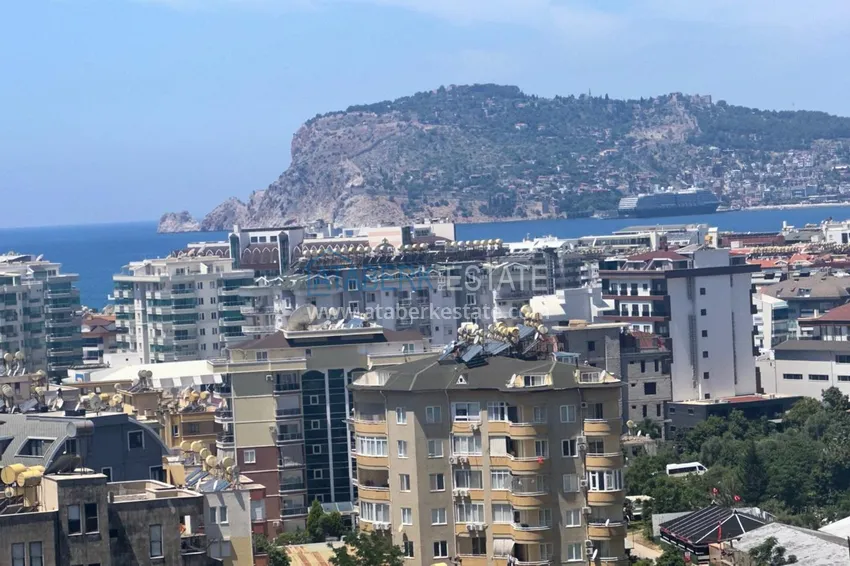 Приобрести Трехкомнатная квартира с мебелью и видом на море в Алании, район Тосмур 15 