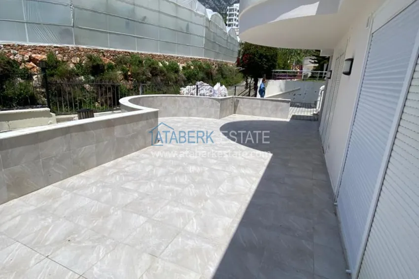 Приобрести Великолепные террасные апартаменты с мебелью и видом на море в Алании, район Махмутлар 16 