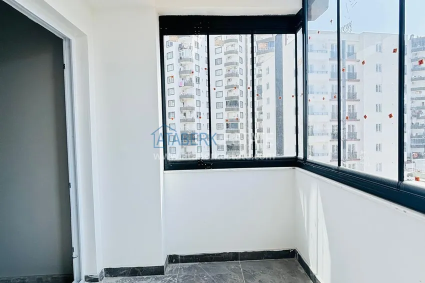 Приобрести Двухкомнатная квартира с застекленным балконом! Новостройки в Мерсине, район Мезитли 15 