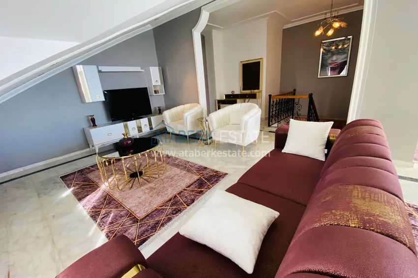 Приобрести Роскошный видовой дуплекс с дизайнерским ремонтом и новой мебелью на первой береговой в Махмутларе, Алания 21 