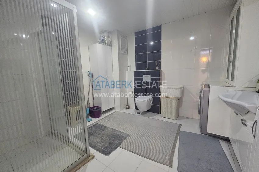 Приобрести Линейная четырехкомнатная квартира с отдельной кухней в районе Джикджилли, Алания 16 