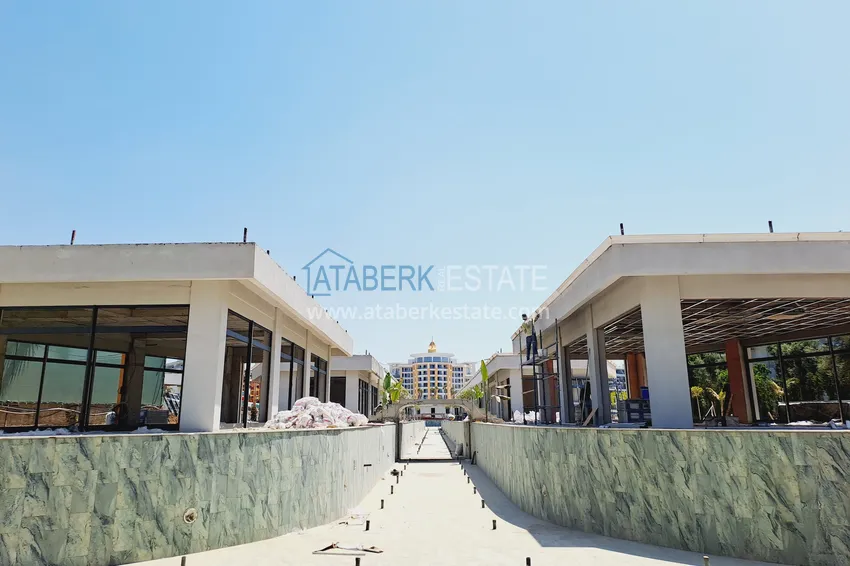 Фото - Современные апартаменты в роскошном комплексе с отельной инфраструктурой – Алания, район Тюрклер 16