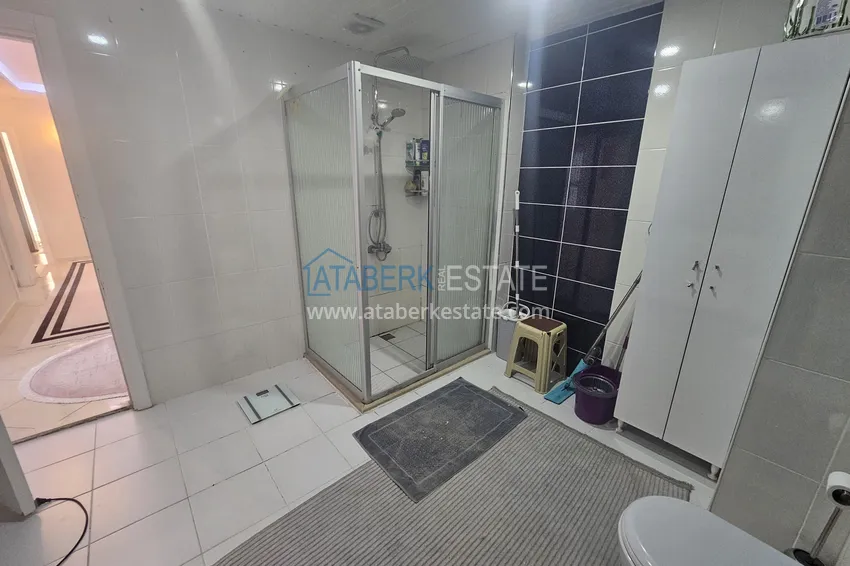 Приобрести Линейная четырехкомнатная квартира с отдельной кухней в районе Джикджилли, Алания 17 