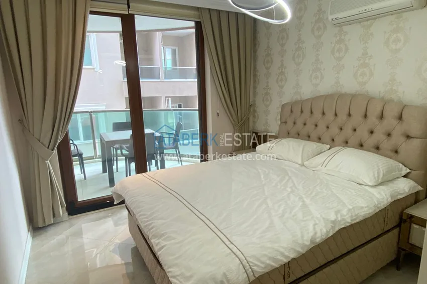 Приобрести Стильная квартира с видом на море в комплексе на первой береговой – район Оба, Алания 19 