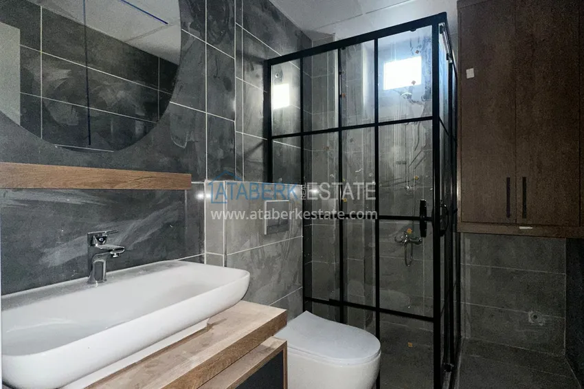 Приобрести Просторные двухкомнатные квартиры в новом комплексе в центре района Мезитли, Мерсин 19 