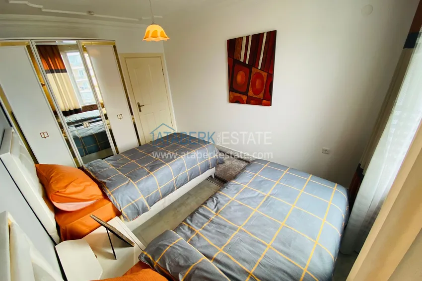 Приобрести Роскошный видовой дуплекс с дизайнерским ремонтом и новой мебелью на первой береговой в Махмутларе, Алания 24 