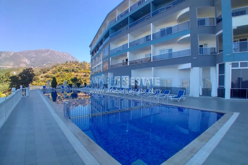 Квартира-студия с мебелью и боковым видом на море в Алании, район Каргыджак 2 