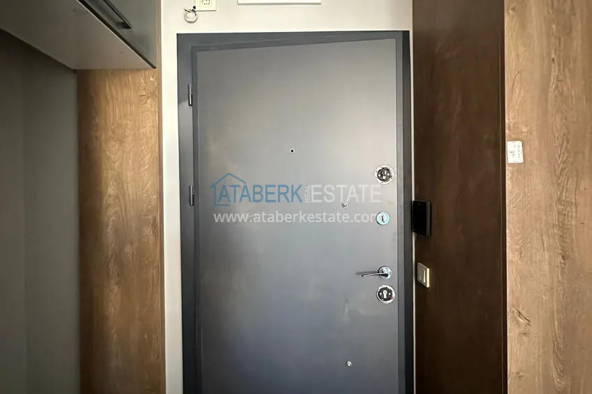 Приобрести Просторные двухкомнатные квартиры в новом комплексе в центре района Мезитли, Мерсин 2 