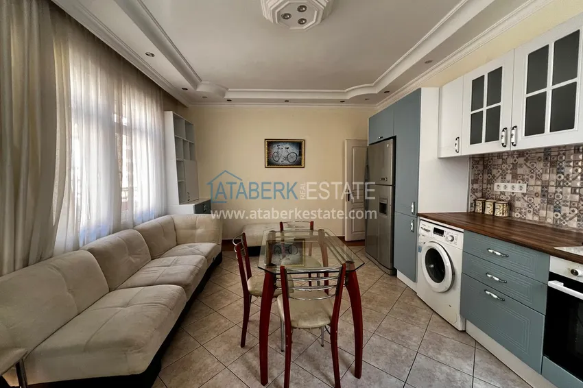 Приобрести Линейная четырехкомнатная квартира с мебелью в районе Махмутлар, Алания 1 