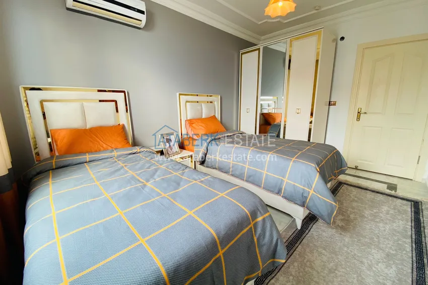 Приобрести Роскошный видовой дуплекс с дизайнерским ремонтом и новой мебелью на первой береговой в Махмутларе, Алания 25 