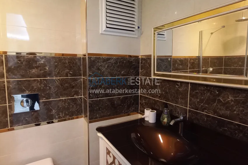 Приобрести Стильная квартира с видом на море в комплексе на первой береговой – район Оба, Алания 21 