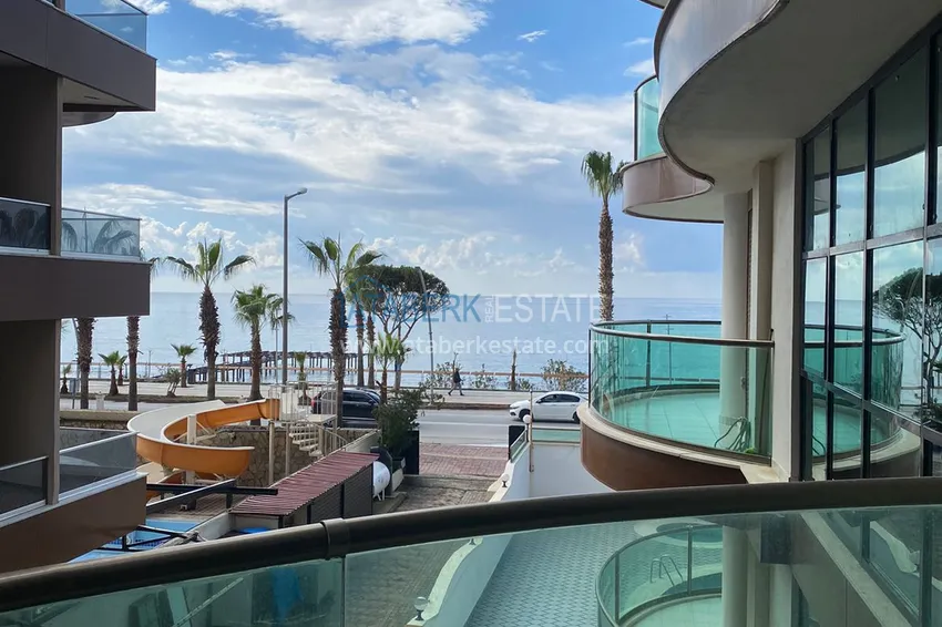 Приобрести Стильная квартира с видом на море в комплексе на первой береговой – район Оба, Алания 24 