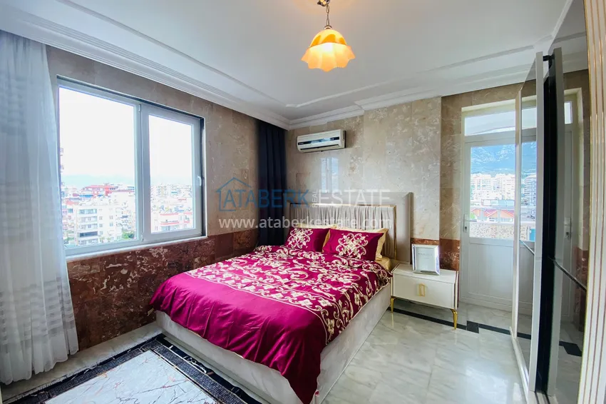 Приобрести Роскошный видовой дуплекс с дизайнерским ремонтом и новой мебелью на первой береговой в Махмутларе, Алания 31 