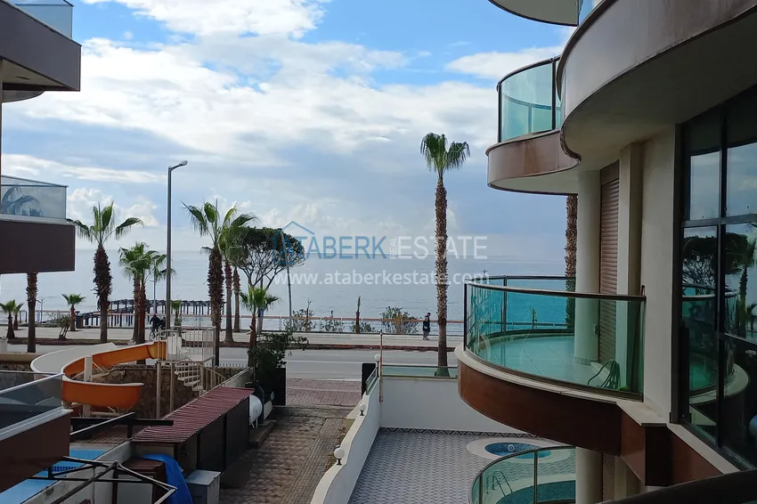 Приобрести Стильная квартира с видом на море в комплексе на первой береговой – район Оба, Алания 25 