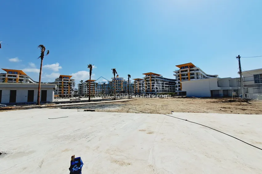 Фото -  Двухкомнатная квартира 85 м2 в строящемся комплекс-отеле в Алании, район Тюрклер 24 