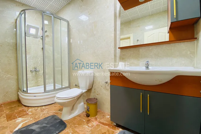 Приобрести Роскошный видовой дуплекс с дизайнерским ремонтом и новой мебелью на первой береговой в Махмутларе, Алания 33 