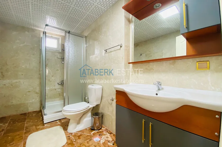 Приобрести Роскошный видовой дуплекс с дизайнерским ремонтом и новой мебелью на первой береговой в Махмутларе, Алания 34 