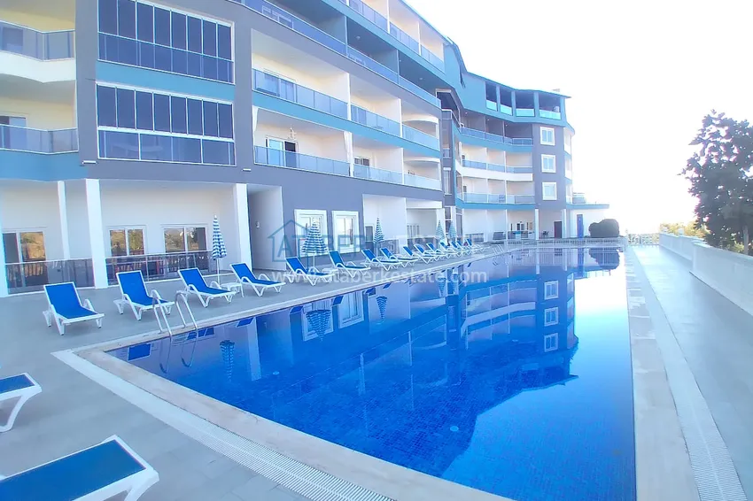 Квартира-студия с мебелью и боковым видом на море в Алании, район Каргыджак 3 