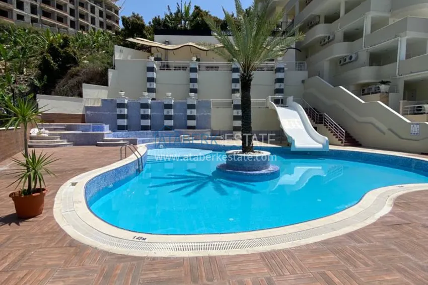 Великолепные террасные апартаменты с мебелью и видом на море в Алании, район Махмутлар 2 