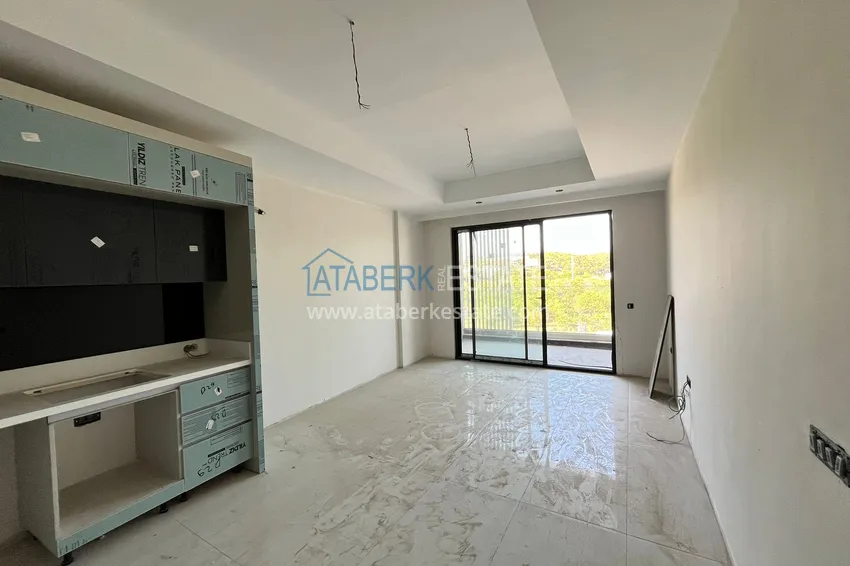 Приобрести Современные апартаменты в роскошном комплексе с отельной инфраструктурой – Алания, район Тюрклер 2