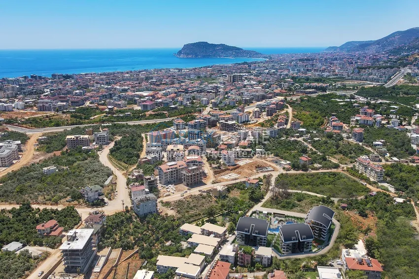 Престижный жилой комплекс на этапе строительства в районе Оба, Аланья 2