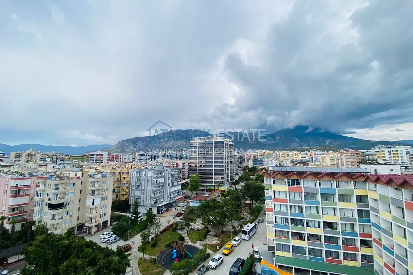 Приобрести Роскошный видовой дуплекс с дизайнерским ремонтом и новой мебелью на первой береговой в Махмутларе, Алания 45 