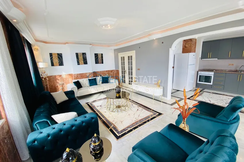 Приобрести Роскошный видовой дуплекс с дизайнерским ремонтом и новой мебелью на первой береговой в Махмутларе, Алания 6 