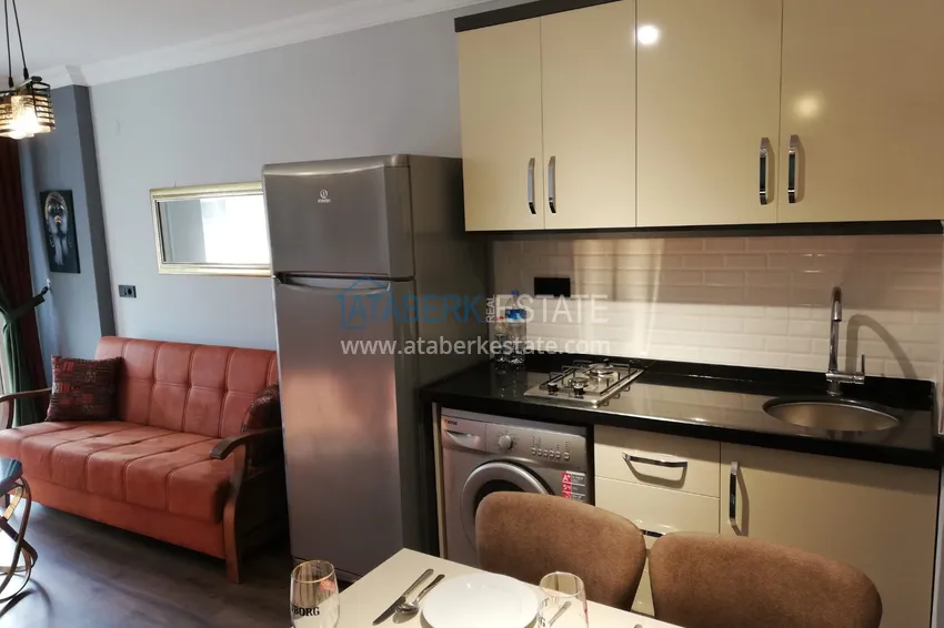 Приобрести Двухкомнатная квартира под ключ с видом на море в 250 метрах от пляжа - район Оба, Алания 4