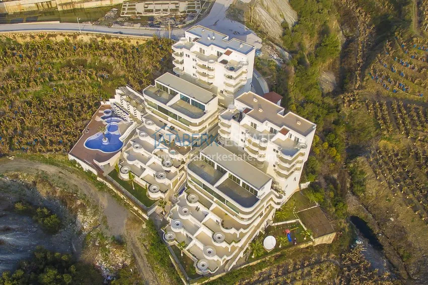 Великолепные террасные апартаменты с мебелью и видом на море в Алании, район Махмутлар 3 