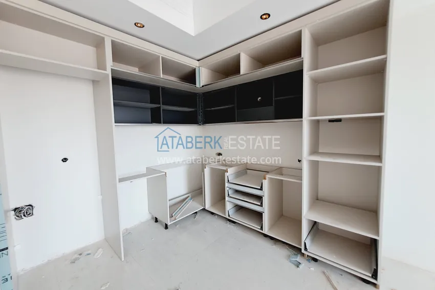 Приобрести Двухкомнатная квартира 85 м2 в строящемся комплекс-отеле в Алании, район Тюрклер 3 