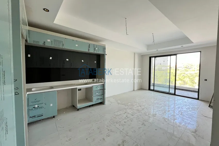 Приобрести Современные апартаменты в роскошном комплексе с отельной инфраструктурой – Алания, район Тюрклер 3