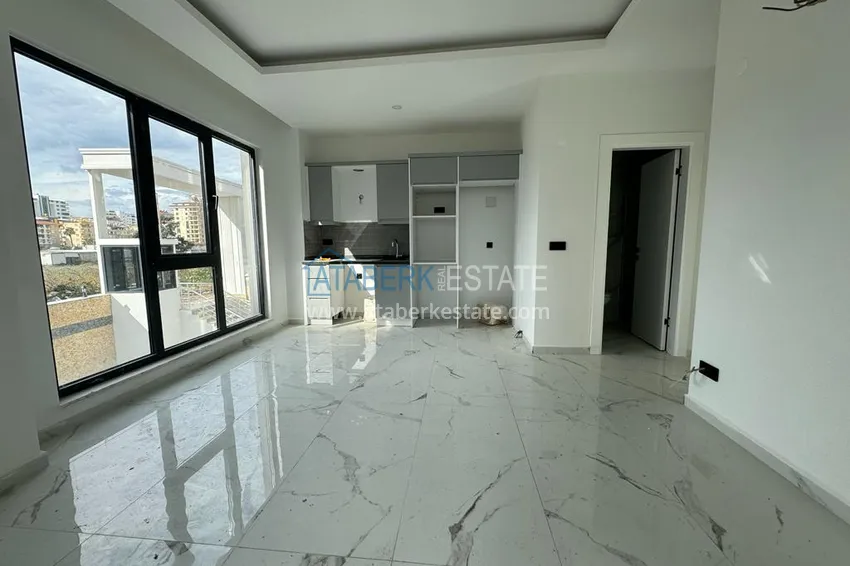 Приобрести Новостройки Алании. Двухкомнатная квартира с чистовой отделкой в районе Махмутлар 3