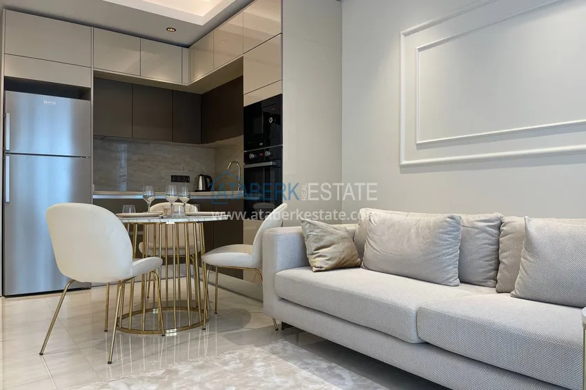 Приобрести Квартира под ключ с видом на море на первой береговой линии, в Алании, район Махмутлар 3 