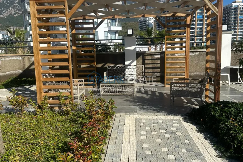 Двухкомнатные квартиры с чистовой отделкой в Алании, район Махмутлар 4 